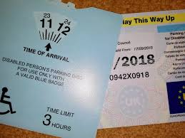 A UK Disabled drivers parking permit commonly know as a Blue Bagde
